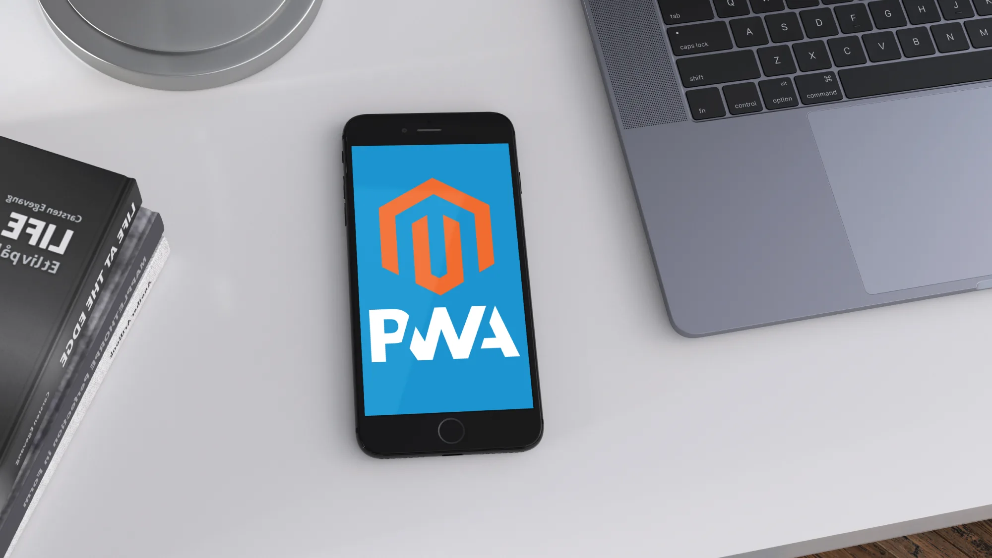 PWA logo displayed on a screen of a mobile phone.